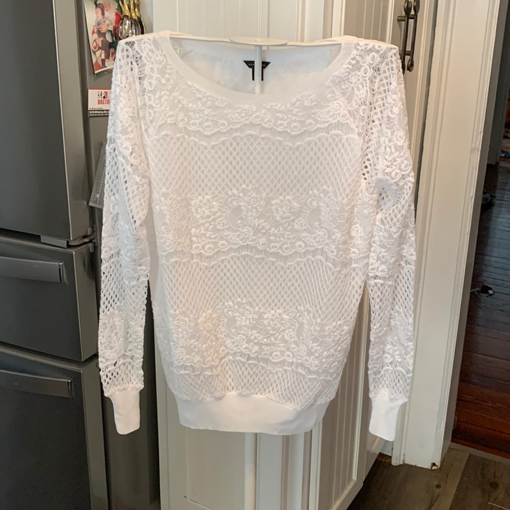 Ann Taylor lace overlay top. Never worn .‎ Fully lined
